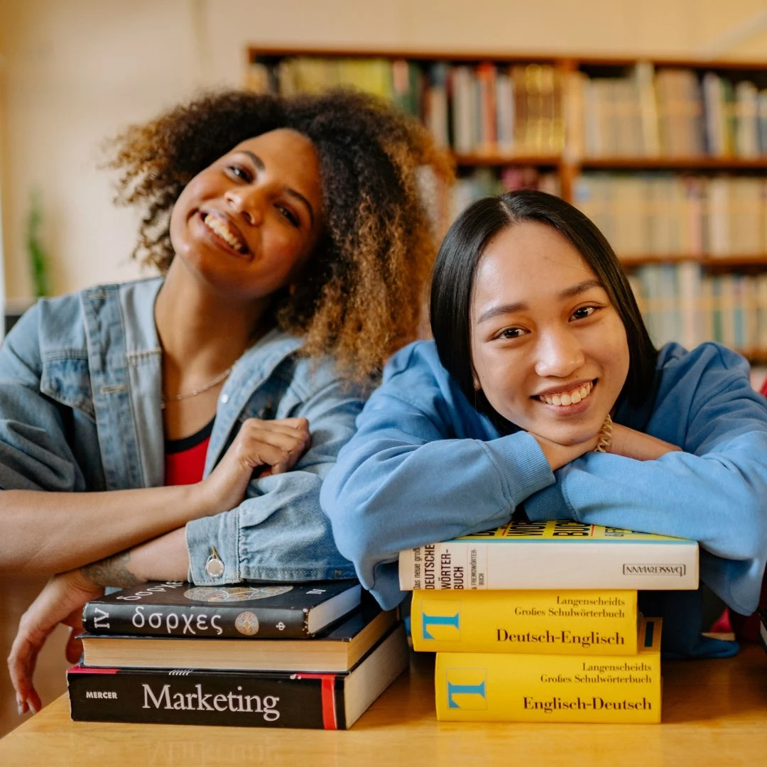 2 students smiling